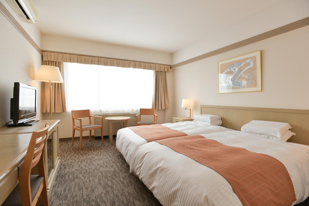ซาโฮโระ รีสอร์ต โฮเทล Hotel Shintoku ภายนอก รูปภาพ